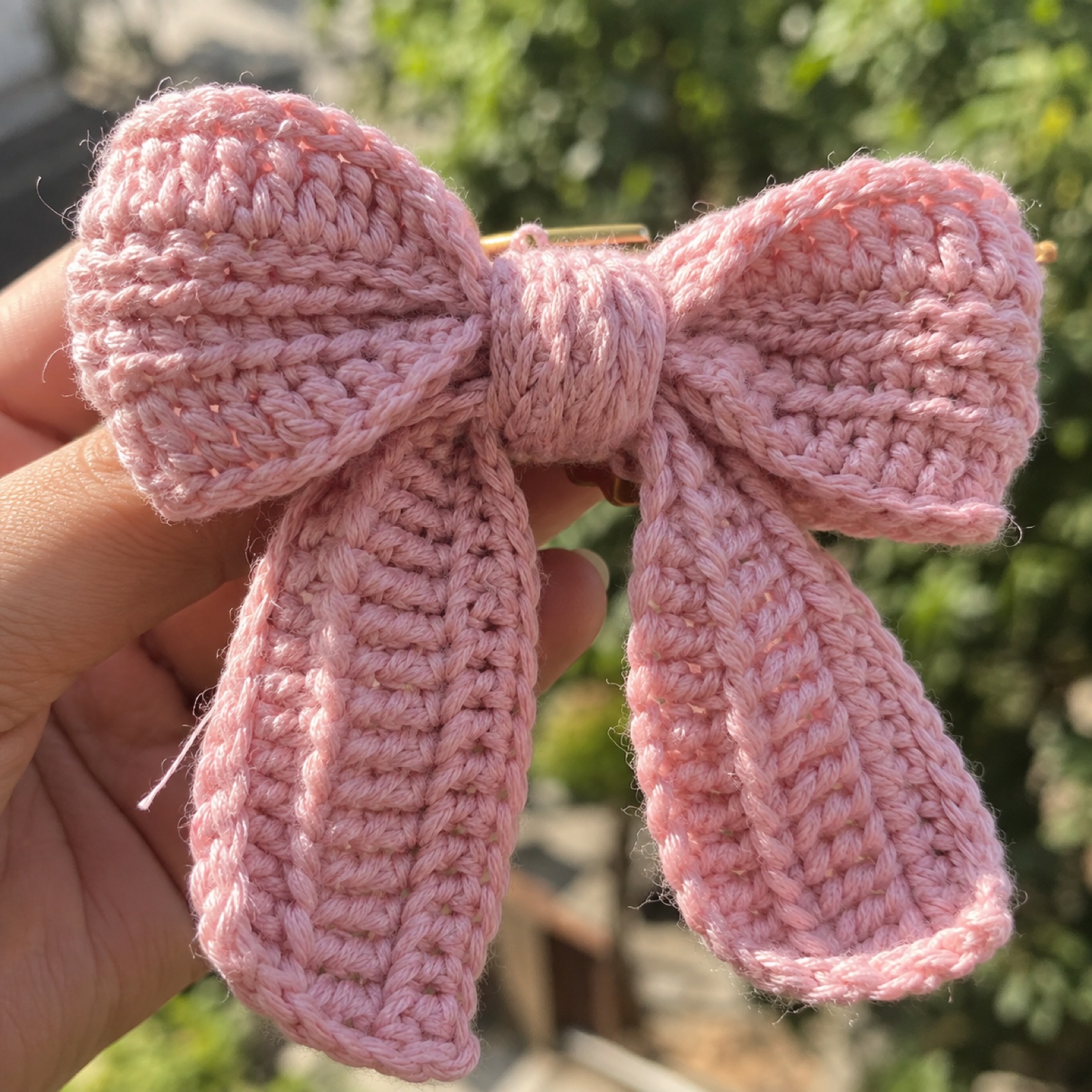 Close-up of the knotted centre of the bow on the Coquette Bow Hair Clip