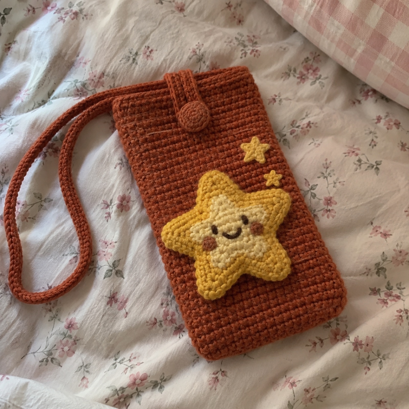 Gold Star Behaviour Phone Pouch: handmade crochet phone pouch with a gold star behaviour appliqué