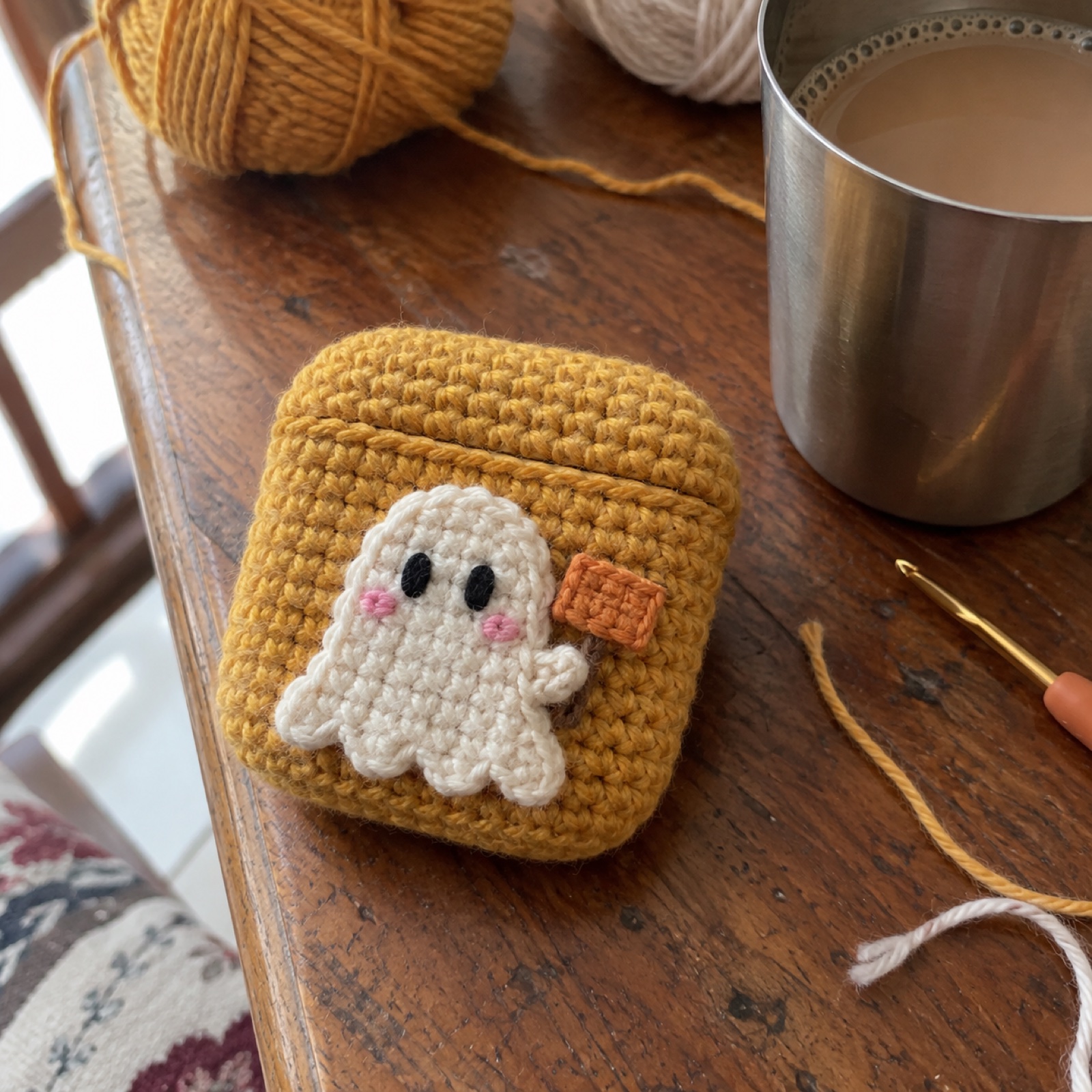 Ghost It Earbuds Pouch: handmade crochet earbuds pouch with a ghost it appliqué