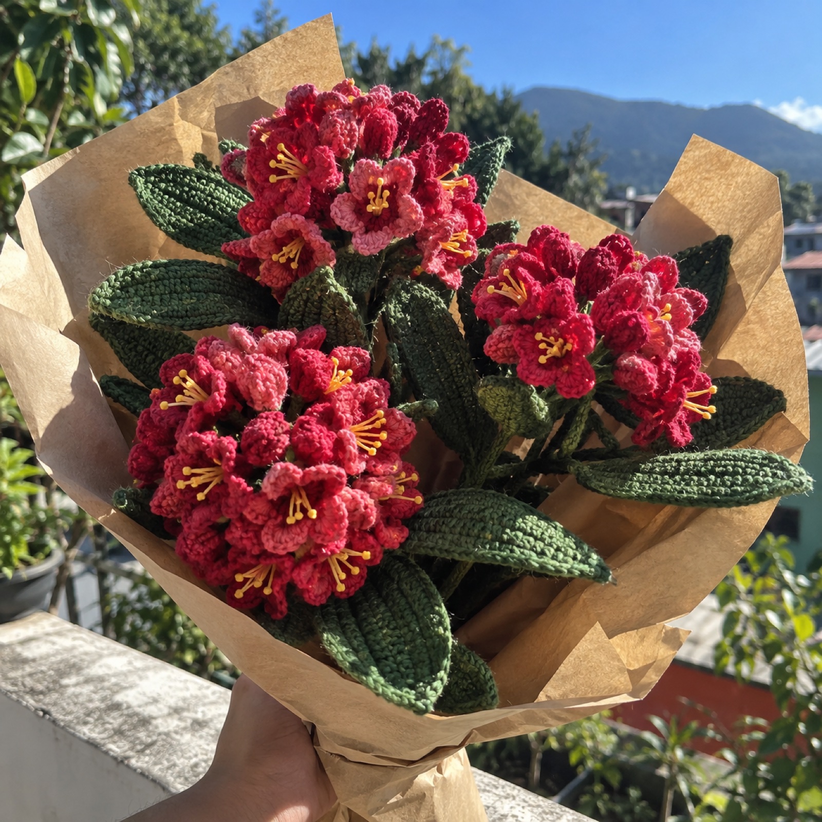 Rhododendron Hill Bouquet: handmade crochet in crimson, deep rose, forest green, kraft