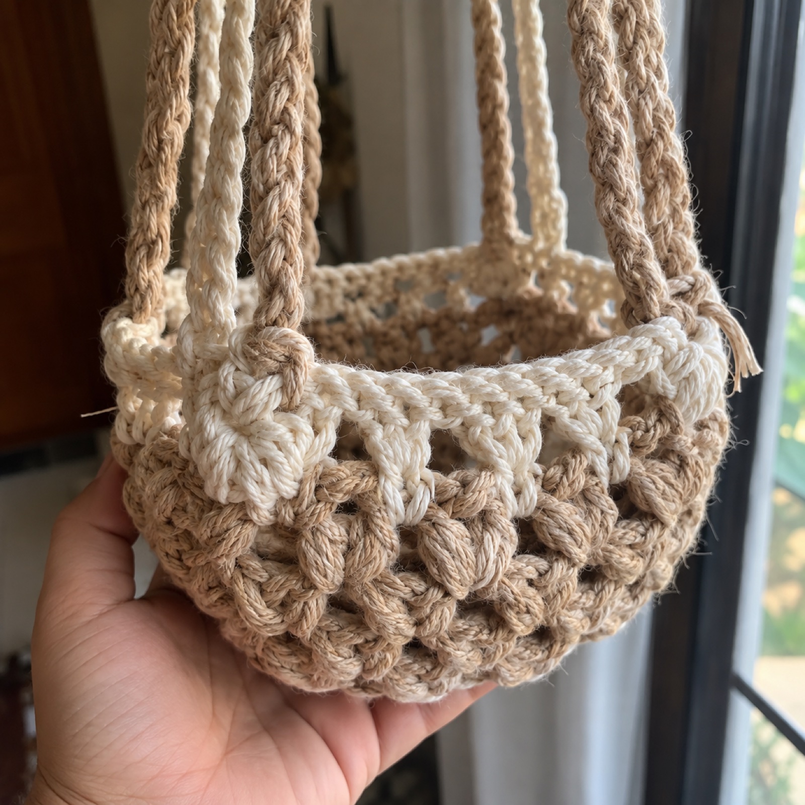 Close-up of the cluster-stitch cradle base and the strands joining it on the Hill Station Plant Hanger