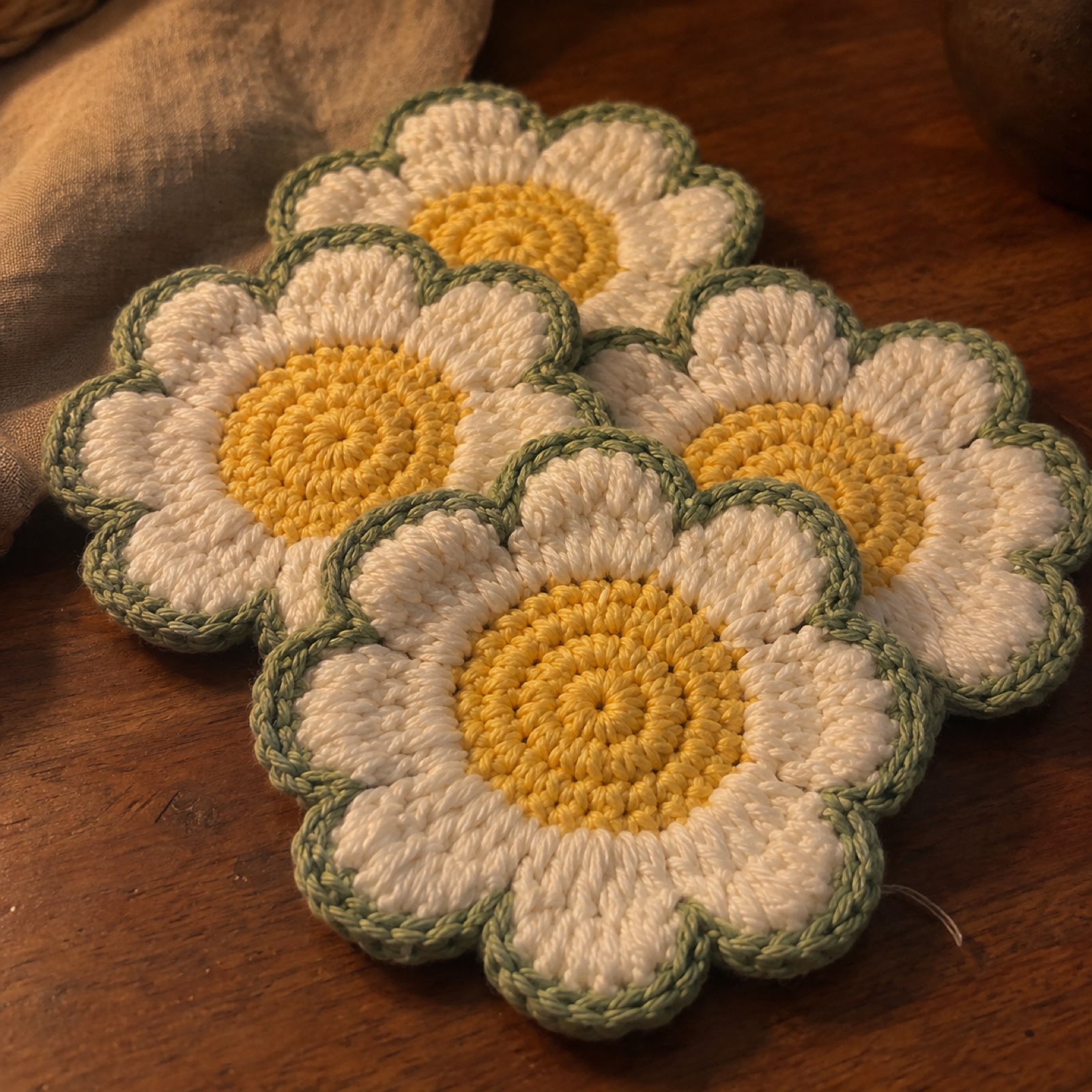 Close-up of the rounded white petals around the yellow centre on the Daisy Coaster Set of 4