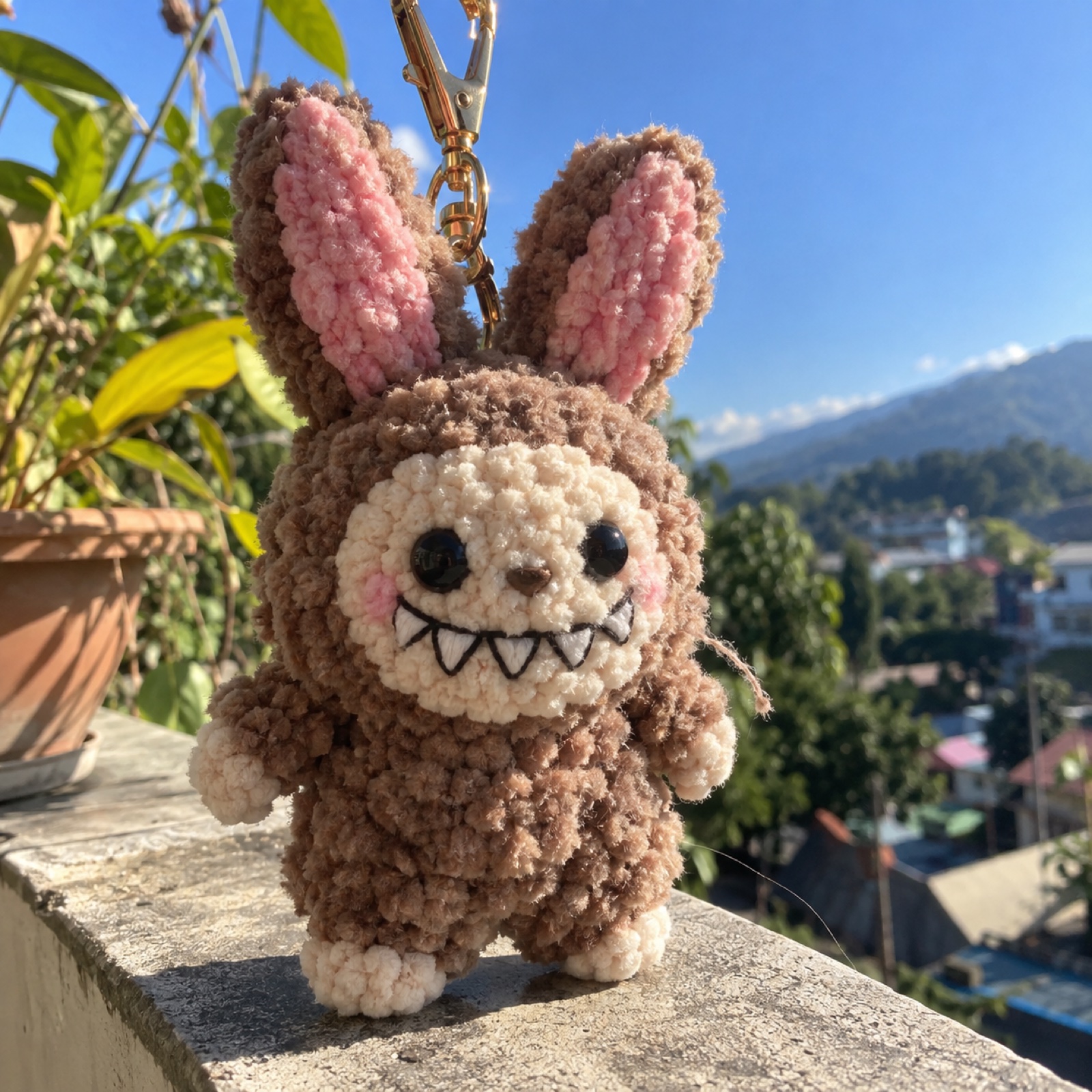 Lil Hill Monster Bag Charm: handmade crochet in mocha, cream, pink