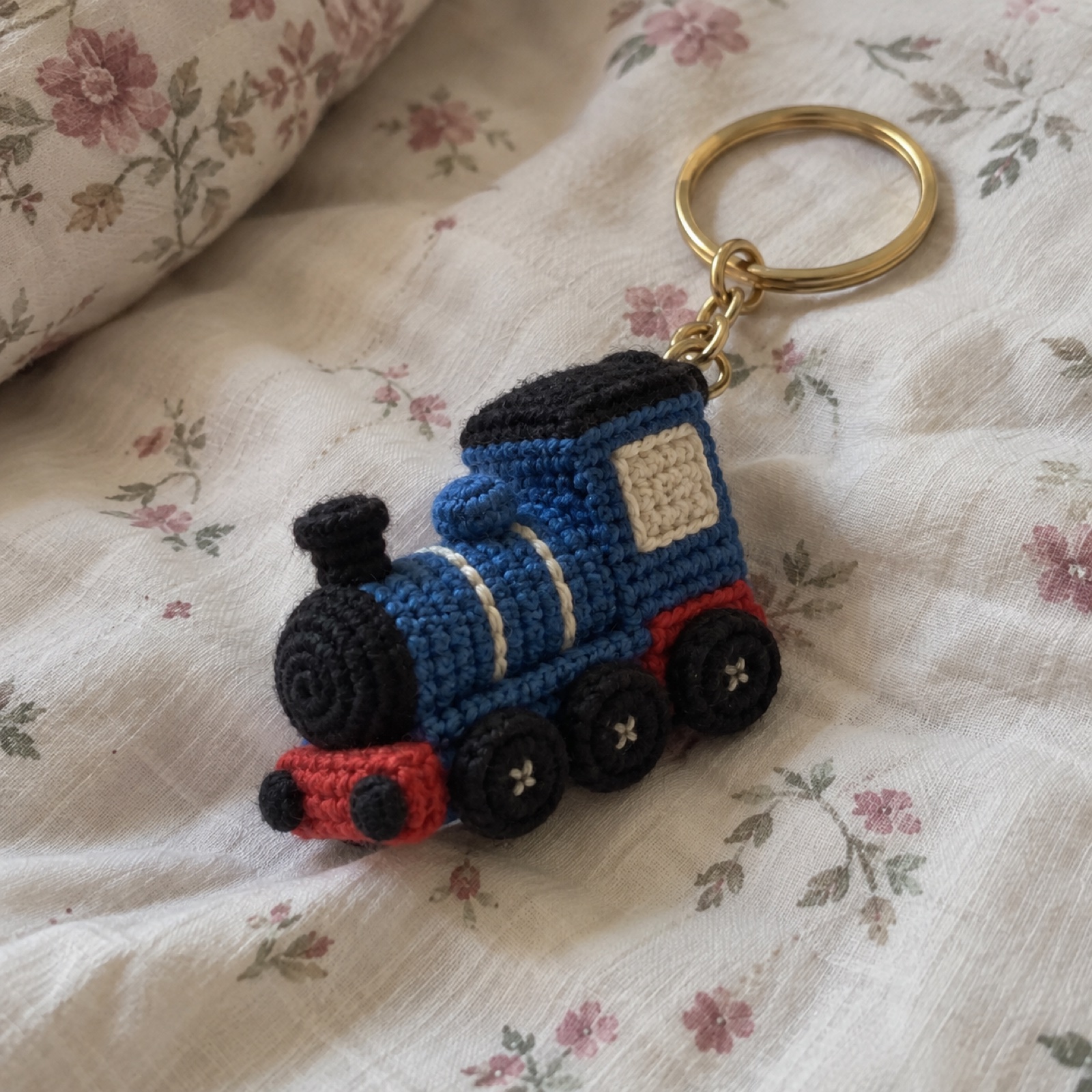 Toy Train Keychain: handmade crochet in railway blue, black, red, cream