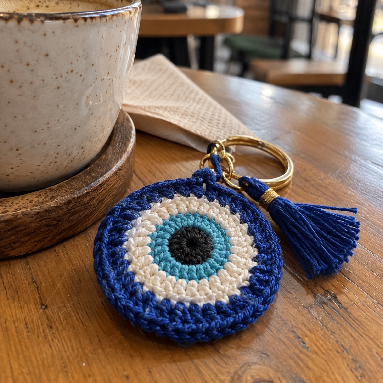 Evil Eye Charm: handmade crochet in deep blue, white, turquoise, black