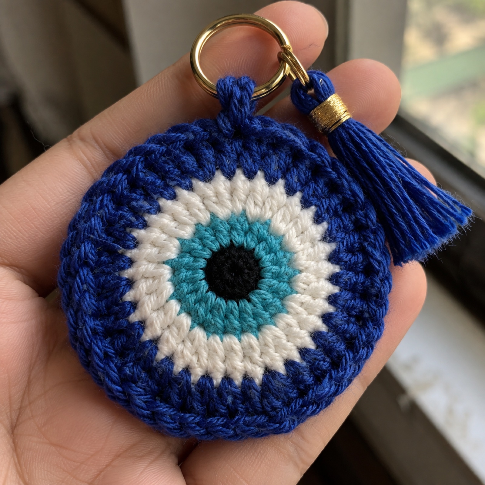 Close-up of the concentric colour rings on the Evil Eye Charm