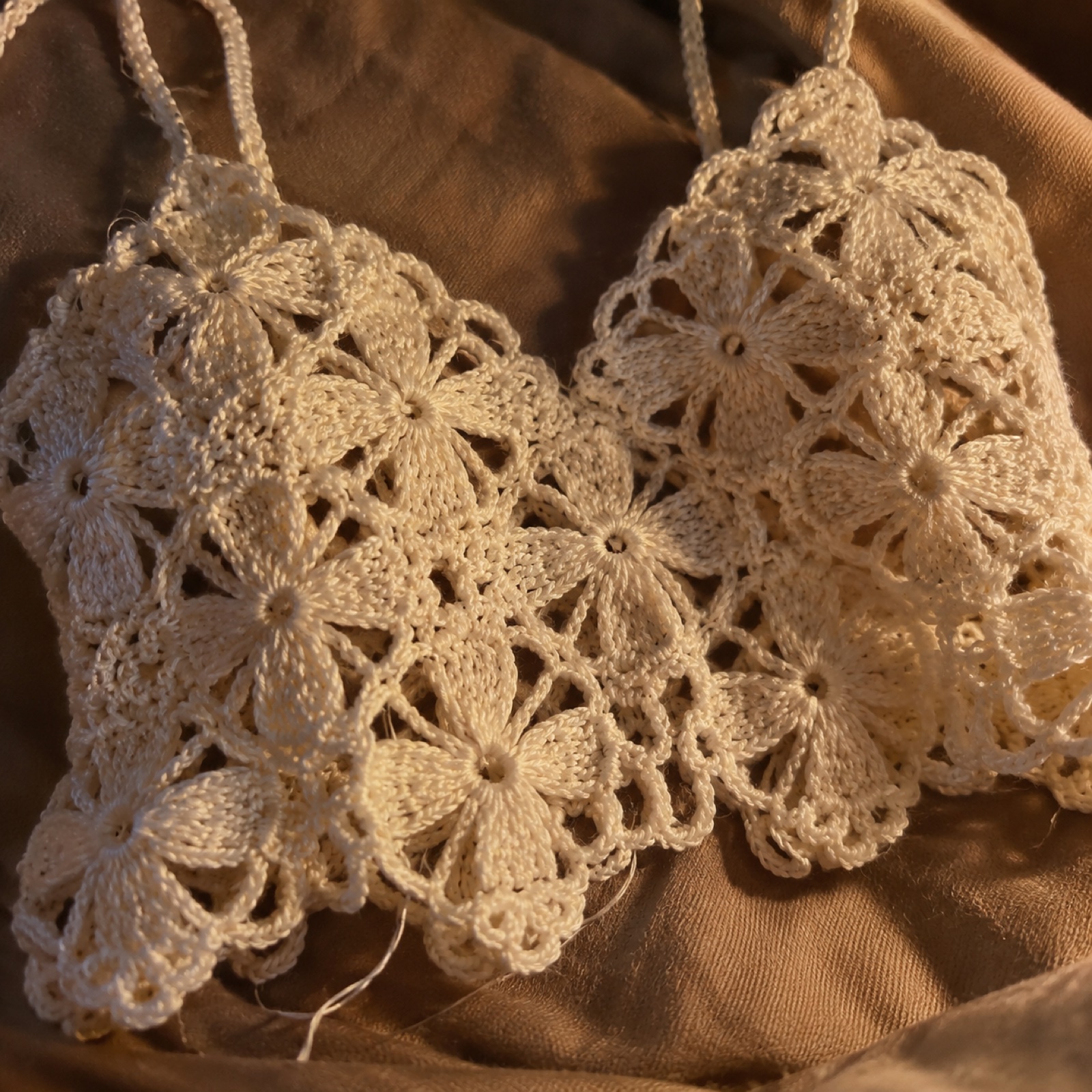 Close-up of the open lace flower motifs and their joins on the Poetcore Lace Crop Top