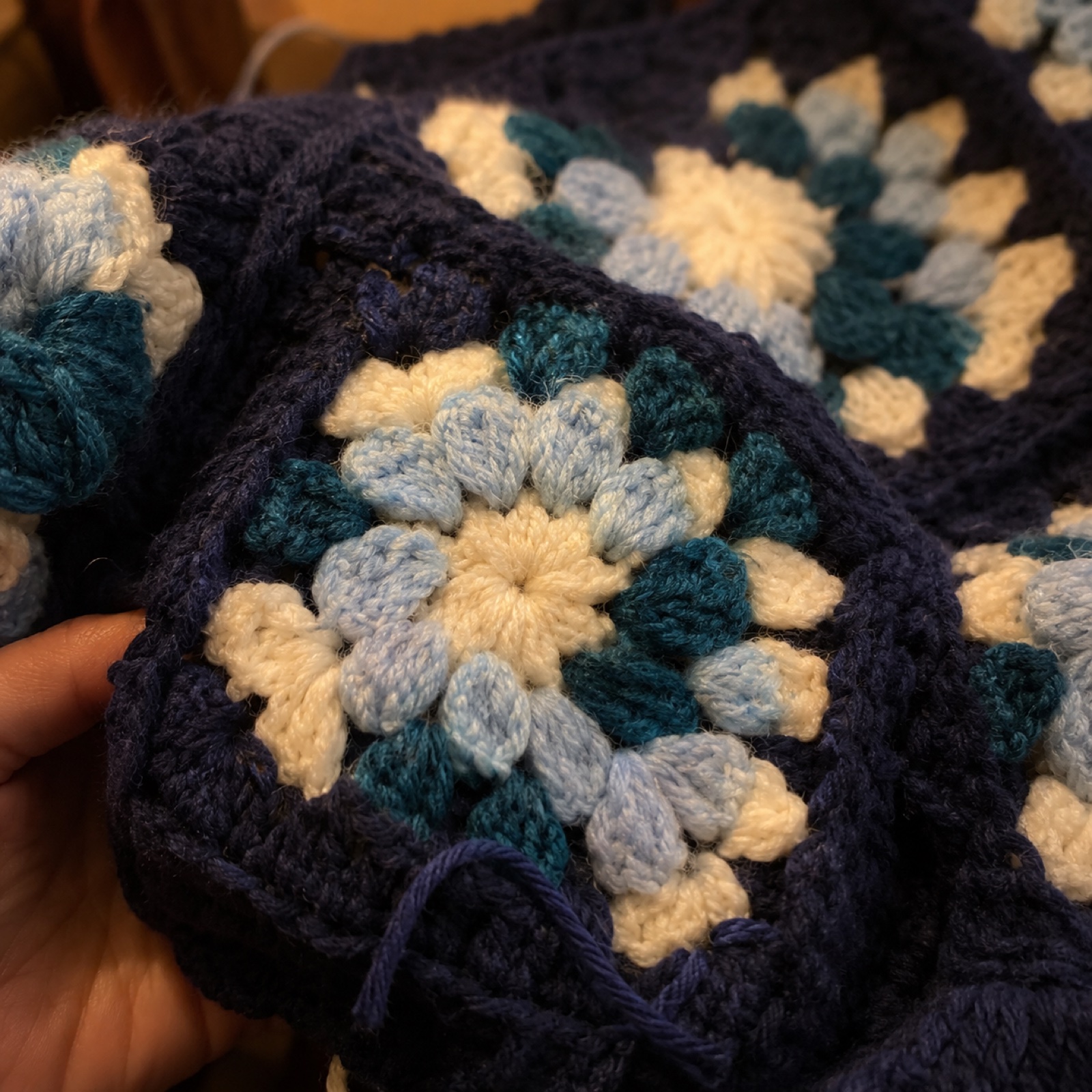 Close-up of the stitches on the Navy Granny Square Cardigan